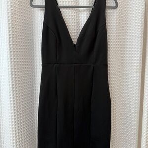 Elegant Black Sleeveless Mini Dress with Plunging Neckline